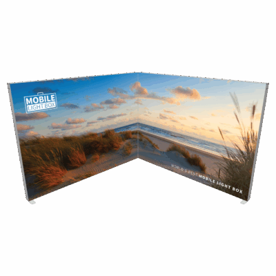 Portable SEG light box corner display with backlit beach sunset graphics for trade show booth