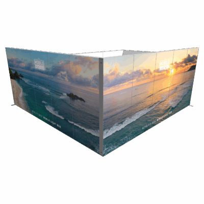 Modular SEG light box booth with backlit ocean graphics in L-shaped configuration for trade shows