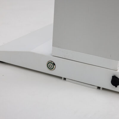 On/off switch and charge port detail on a Mobile Light Box battery base.