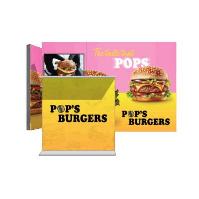 Modular SEG light box display system with backlit Pop's Burgers branding and food graphics for trade show booth