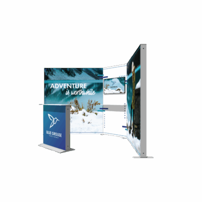 Modular SEG light box trade show display with backlit banners and Blue Grouse Travel Agency branding in booth configuration
