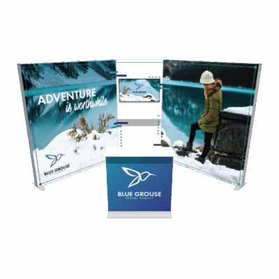 Modular SEG light box trade show display with backlit graphics and counter for Blue Grouse Travel Agency booth