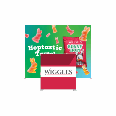 Portable SEG light box trade show display featuring Wiggles candy branding with vibrant backlit graphics and counter